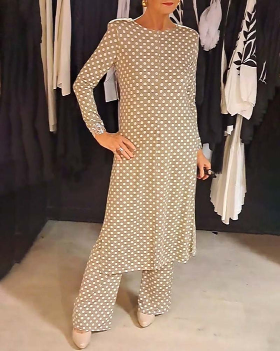Elegant prickig slitskostym