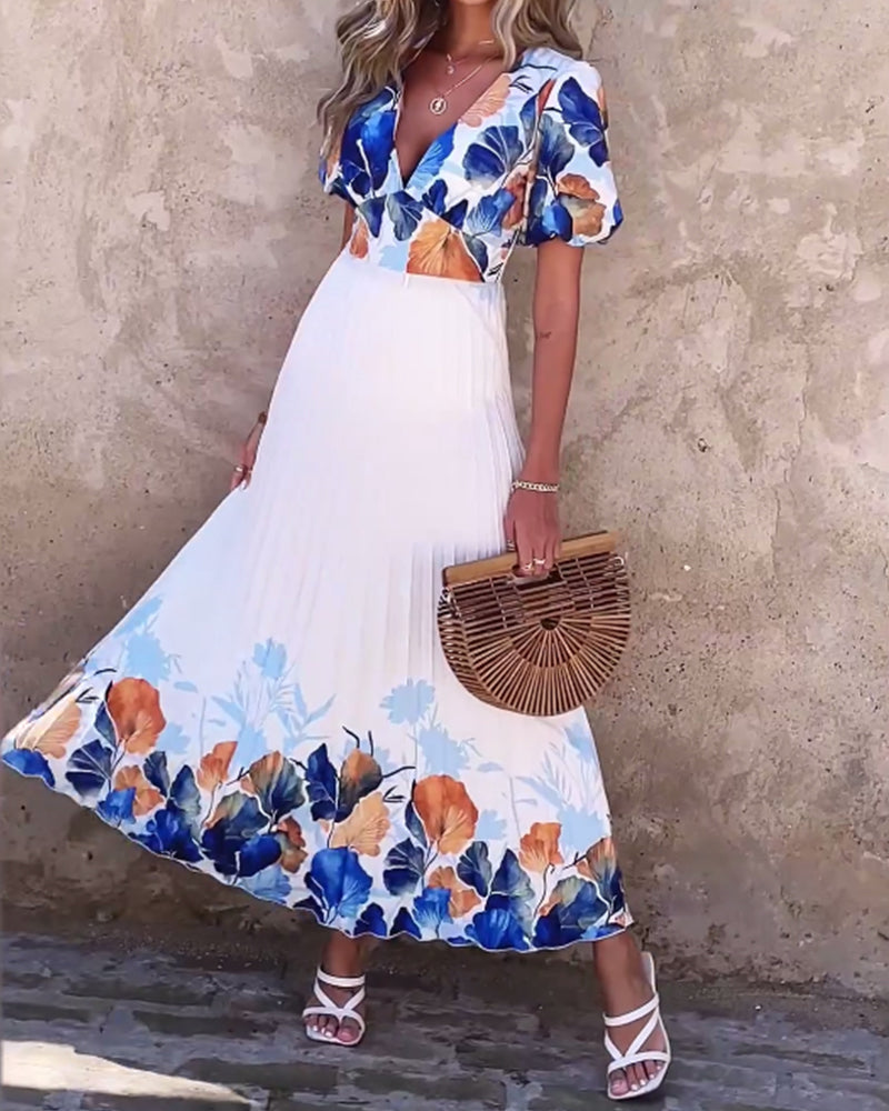 Klänning i djup V-modell med bubbliga ärmar