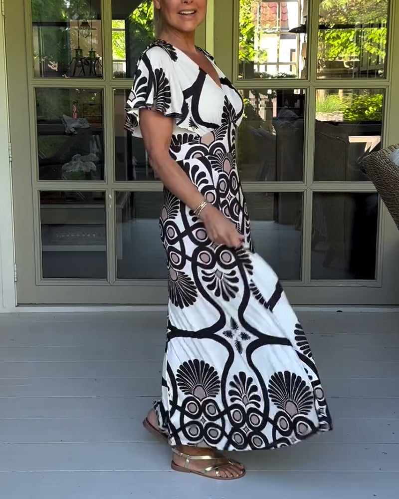 Kortärmad klänning med vintagetryck