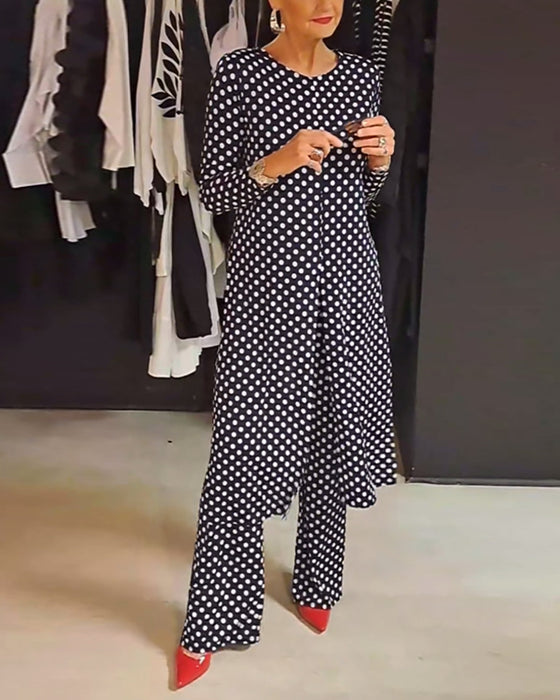 Elegant prickig slitskostym