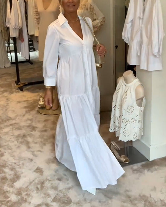 Klänning med knappar och slag