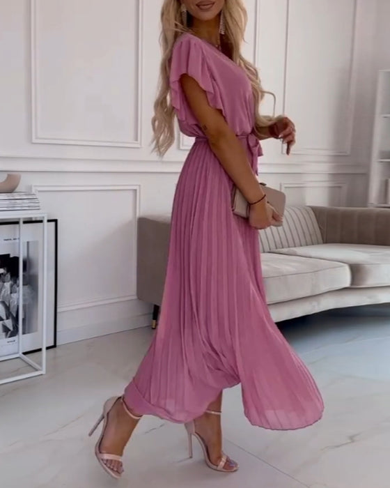 Enfärgad elegant klänning med volang ärm och V-ringning