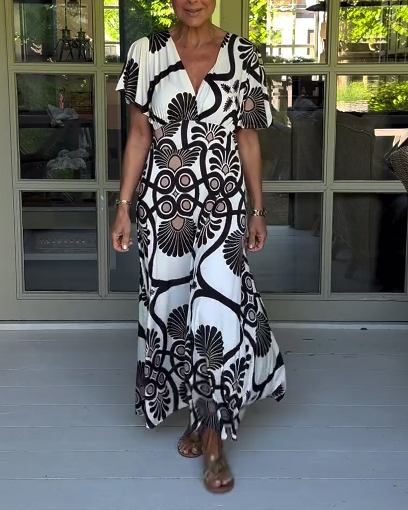 Kortärmad klänning med vintagetryck