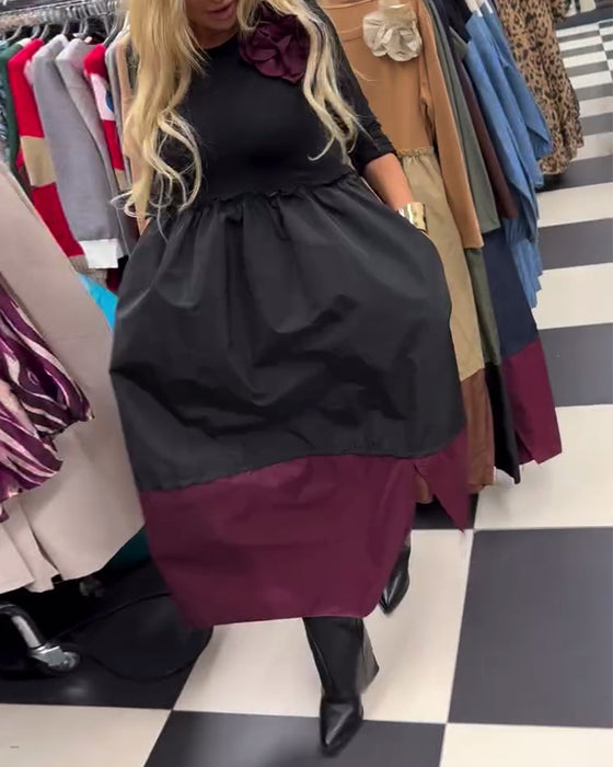 Elegant klänning med kontrasterande slitsar