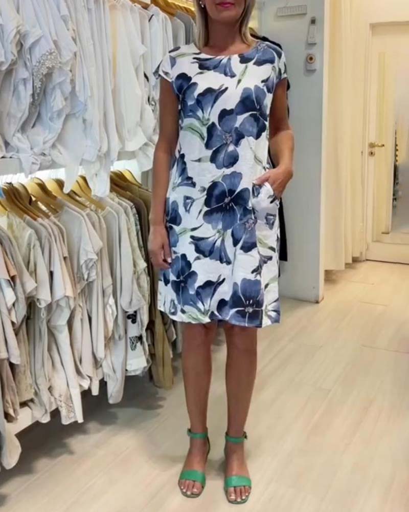 Kortärmad klänning med blommönster