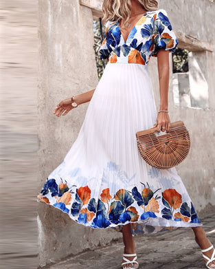 Klänning i djup V-modell med bubbliga ärmar