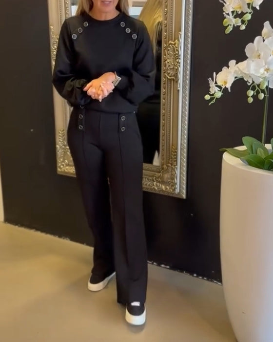 Tvådelat set - enfärgad blus och byxor med rund hals