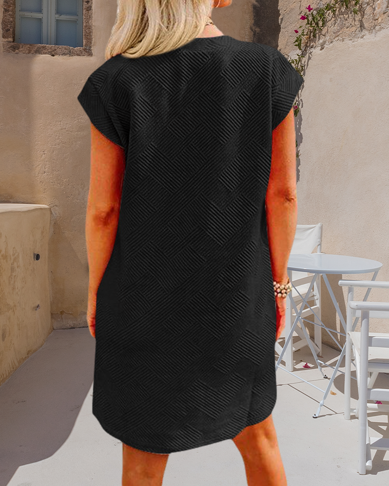 Kortärmad klänning med rund halsficka