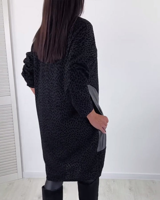Elegant klänning med rund hals och panel