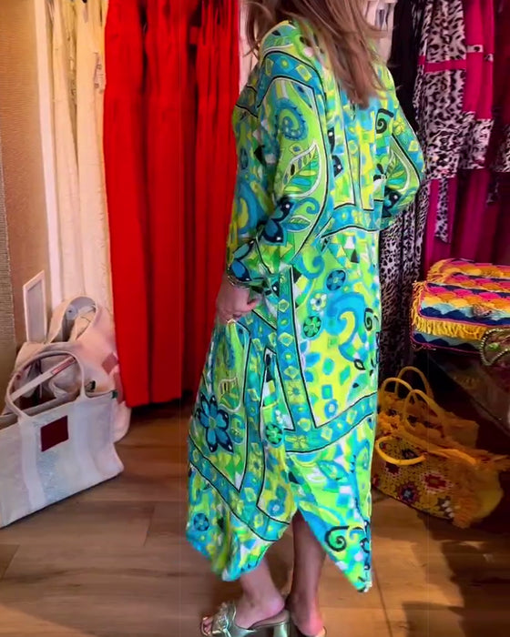 Klänningar med lös passform och tryck och fickor