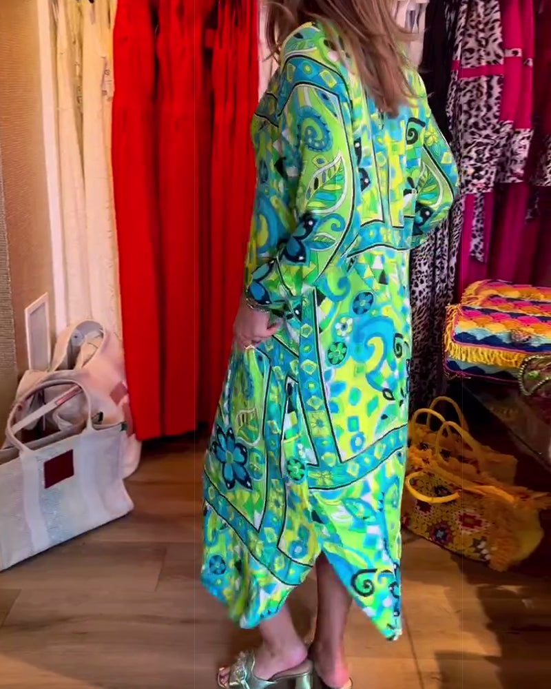 Klänningar med lös passform och tryck och fickor