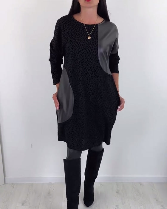 Elegant klänning med rund hals och panel