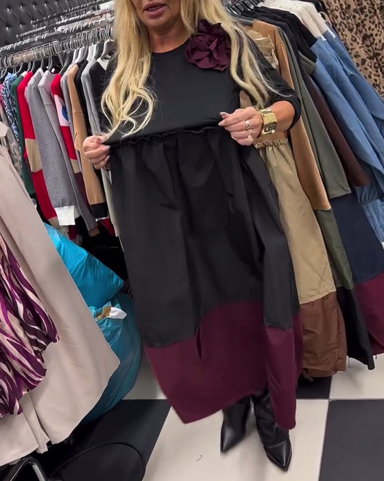 Elegant klänning med kontrasterande slitsar
