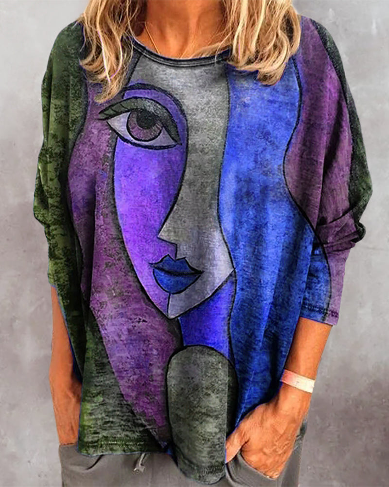 Långärmad topp med ansiktstryck