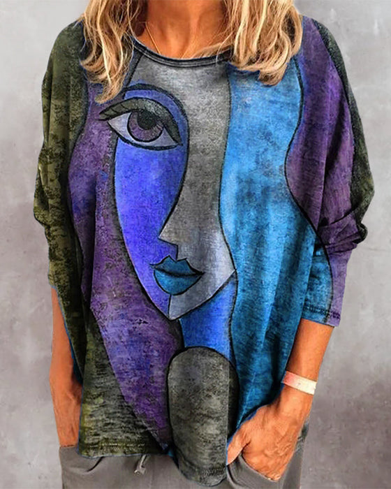 Långärmad topp med ansiktstryck