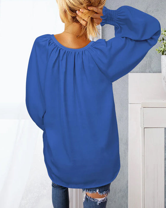V-ringad Blus