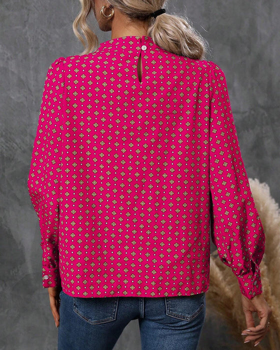 Blus med vintagestil och tryck