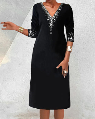 Långärmad klänning med tryck