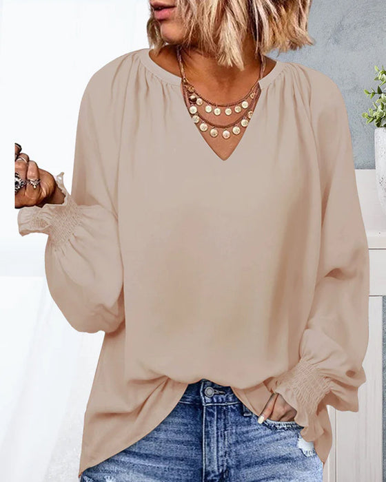V-ringad Blus