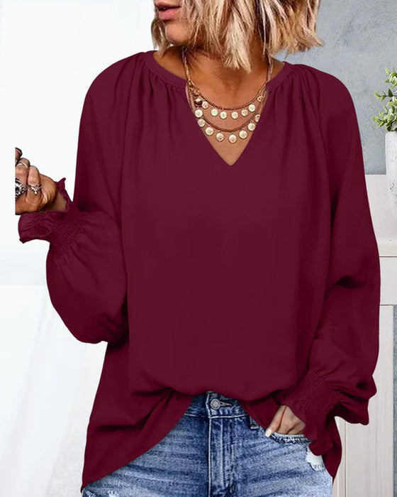 V-ringad Blus