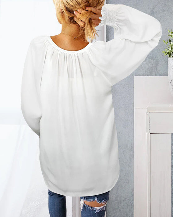 V-ringad Blus