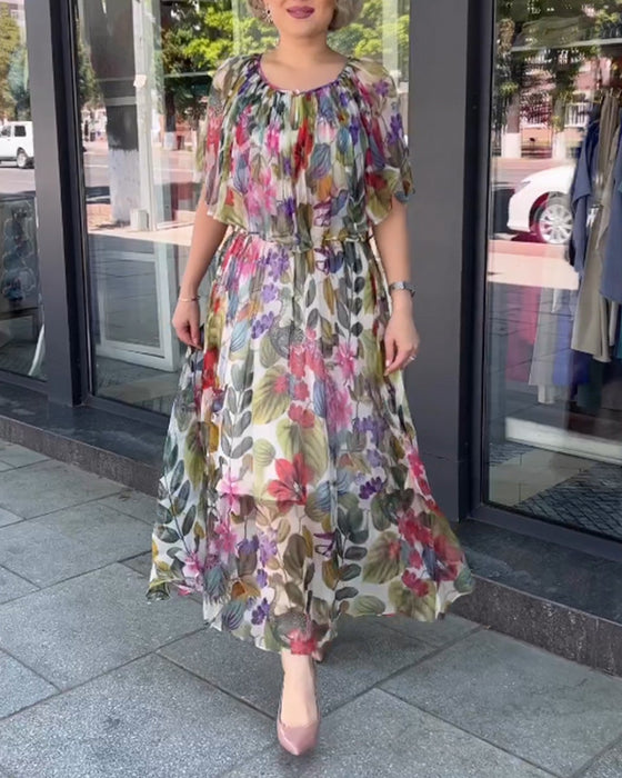 Blommig klänning med rund hals
