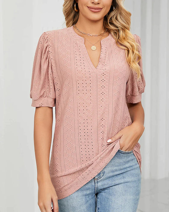 Elegant T-shirt med puffärmar och V-ringning