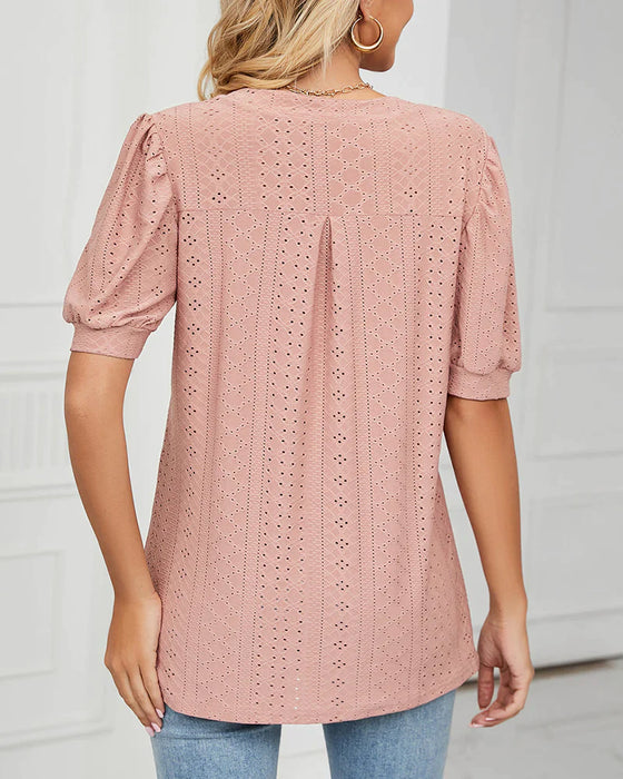 Elegant T-shirt med puffärmar och V-ringning