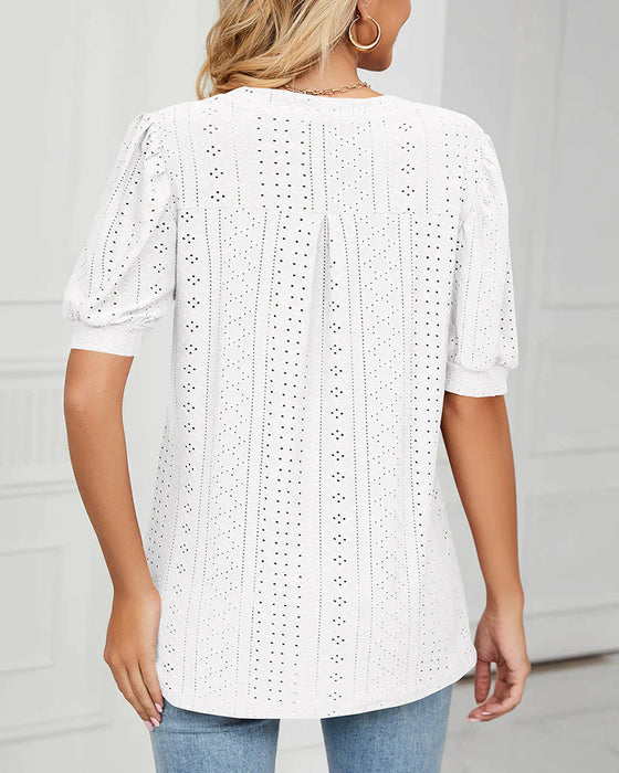 Elegant T-shirt med puffärmar och V-ringning