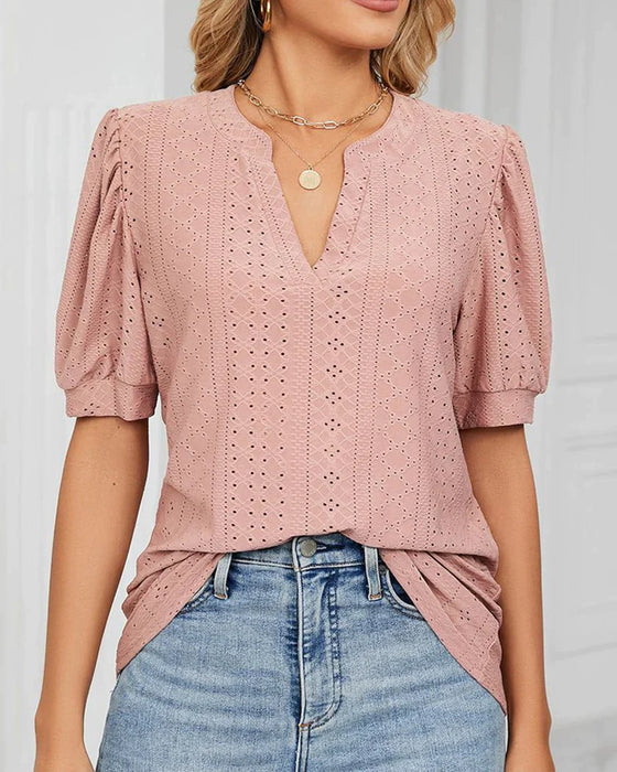 Elegant T-shirt med puffärmar och V-ringning