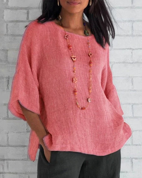 Enfärgad topp med 3/4 ärm med rund hals