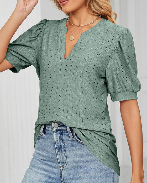 Elegant T-shirt med puffärmar och V-ringning