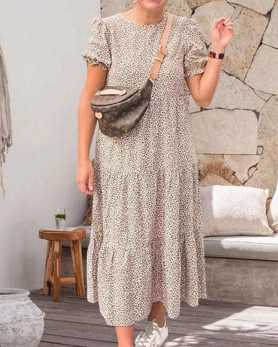 Klänning med puffärmar och tryck