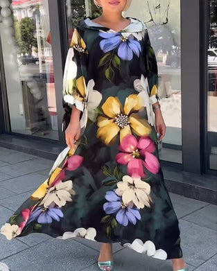 Blommig klänning med 3/4-ärm