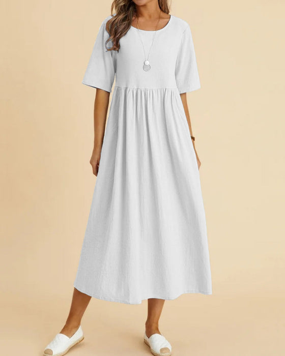 Enfärgad midiklänning med halvärm