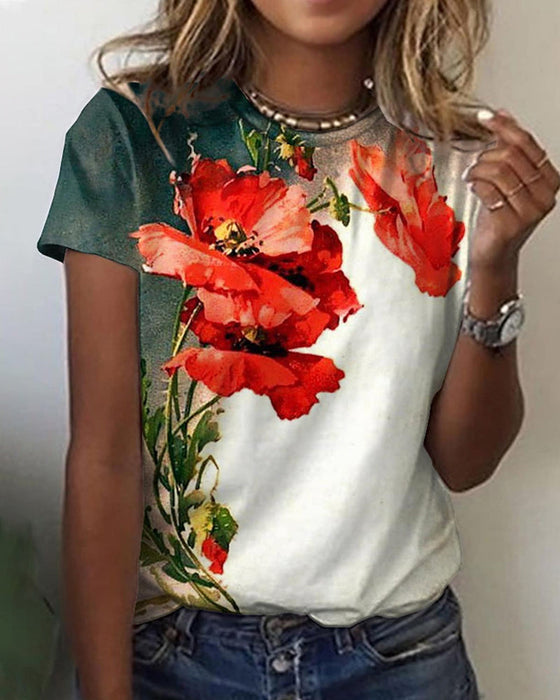 T-shirt i blommönster med rund hals och kort ärm