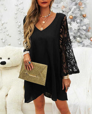 Svart klänning med spetsärmar