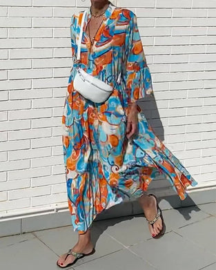 Klänning med volang ärm och v-ringning