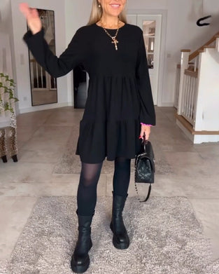 Enkel enfärgad långärmad klänning