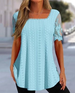 Ihålig broderiblus med kort ärm