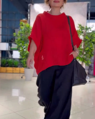 Enfärgad topp med hög halsringning