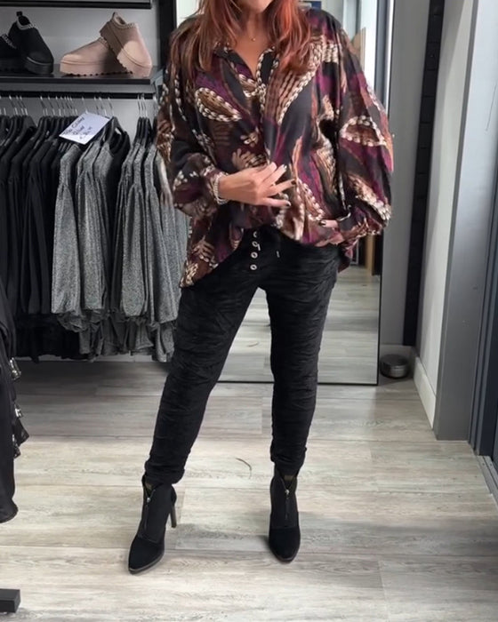 Blus med V-ringning och tryck