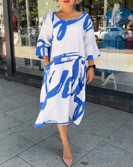 Modetryck fickklänning