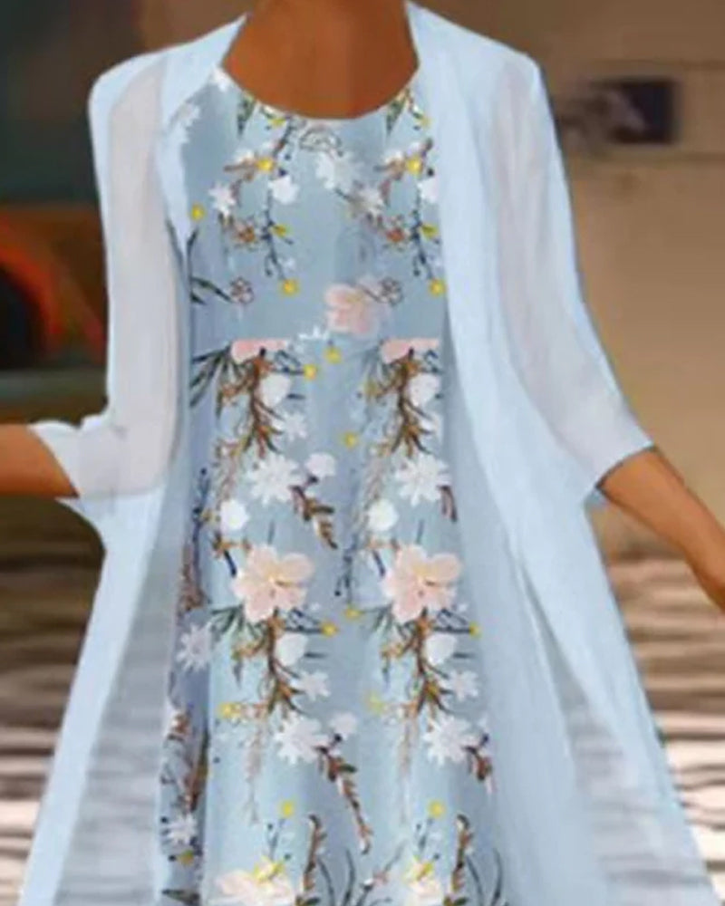 Klänning med 3/4-ärm och blommönster