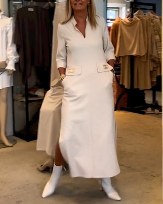 Enfärgad klänning med 3/4-ärm slits