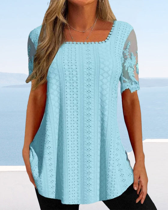 Ihålig broderiblus med kort ärm