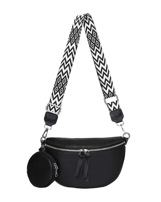 Kvinnors axelväska i sadelform, som också kan bäras som en crossbody-väska