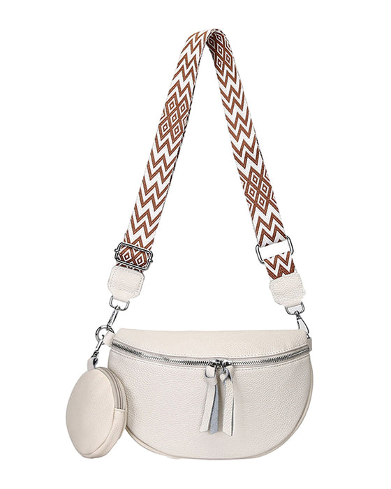 Kvinnors axelväska i sadelform, som också kan bäras som en crossbody-väska