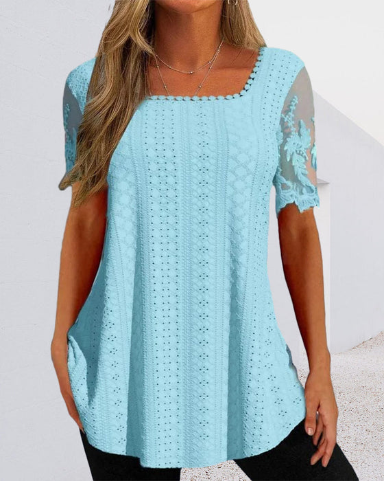 Ihålig broderiblus med kort ärm