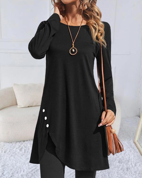 Oregelbunden enfärgad långärmad topp